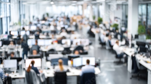 Blurred view of people working in a modern office space