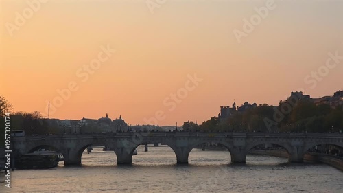 Sunset Over Seine River and Historic Bridge in Paris, France