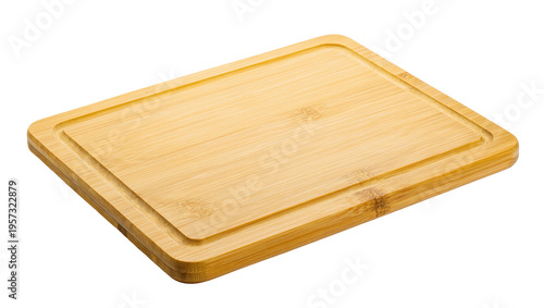 Photos Angled view of a natural bamboo wooden cutting board for kitchen food preparatio