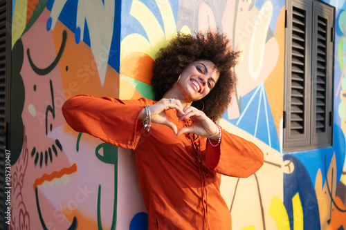 Photos Successful woman embracing a feeling of liberation, standing confidently against