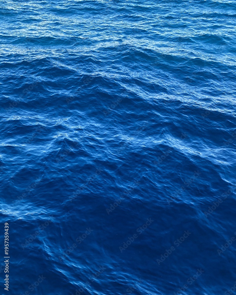 Obraz premium Blue water of the Mediterranean Sea for the background. Top view.