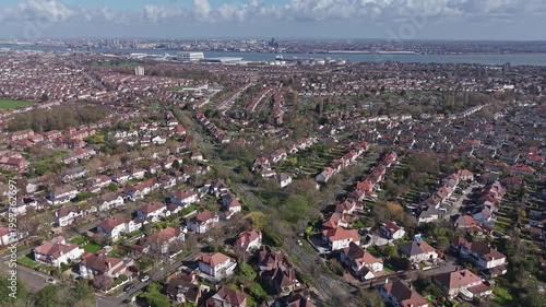 Aerial view of Wirral suburban housing with the River Mersey, Merseyside, England