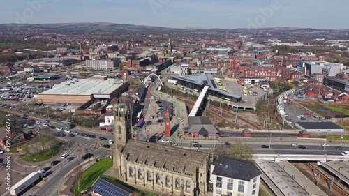 BOLTON, GREATER MANCHESTER, ENGLAND - MARCH 18, 2026: Bolton town centre, with the Parish Church of All Saints, supermarket and the bus station