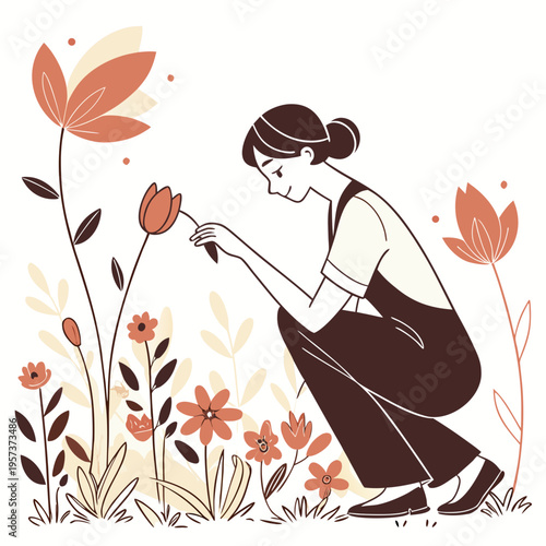 Woman in brown overalls tending to flowers gardening