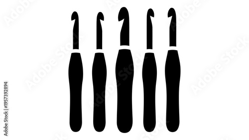 Set of five crochet hooks for yarn crafting isolated on white background