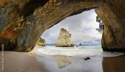 Cathedral Cave with detached calcareous sandstone rocks, Cathedral Cove Beach, Mercury Bay, Te Whanganui-A-Hei, Hahei, Coromandel Peninsula, North Island, New Zealand