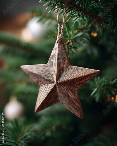 Wallpaper Mural Rustic wooden star ornament hanging from a Christmas tree branch, depicting warm holiday spirit and festive decoration ideas for winter season Torontodigital.ca