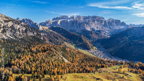 Aerial view of Selva di Val Gardena and the Sella Group in the Dolomites in autumn