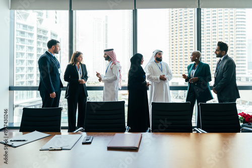 Fotografie Multiethnic business team networking during corporate meeting in dubai