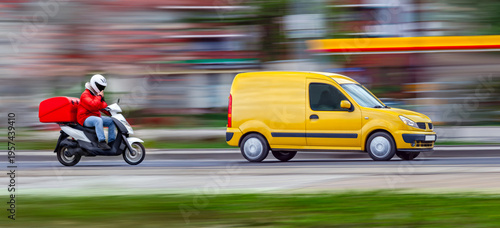 Fast delivery of online purchases. A van and a courier on a scooter race through city traffic to their destination. Panning and motion blur
