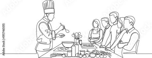 people sitting around a table with food