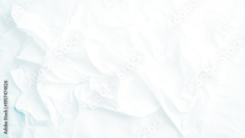 Blank white crumpled and creased paper poster texture background.