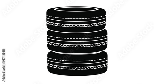 Stack of four black tires with tread patterns isolated on white