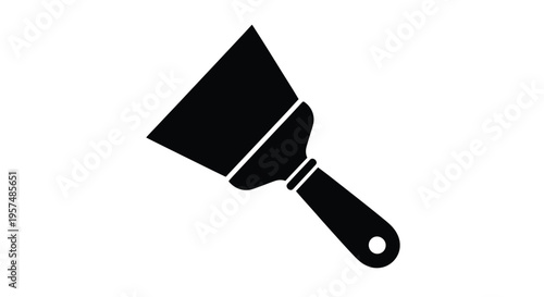 A black silhouette of a putty knife a tool used for applying filler