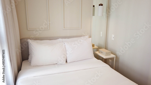 Cozy Light-Toned Bedroom with Aesthetic Bedding and Minimalist Decor