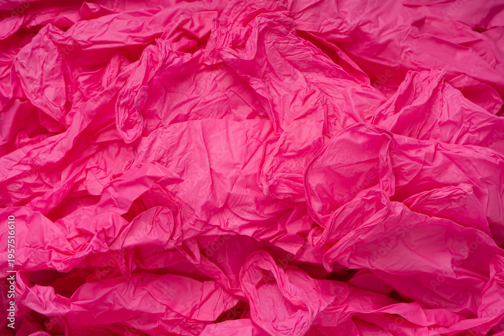 Obraz premium Pink and blue latex sterile medical gloves as a background.