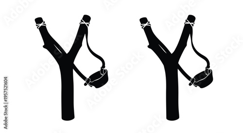 Two black silhouettes of slingshots against a plain white background