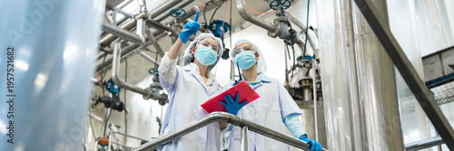 Food factory laboratory industry production quality inspection safety hygiene technician manufacturing workers checking industrial processing equipment in stainless facility, food quality control