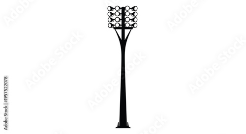 Black silhouette of a tall sports stadium floodlight tower
