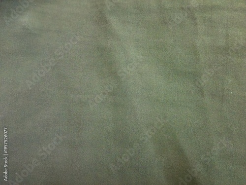 Full Frame Background of Textured Olive Green Fabric with Subtle Weave Pattern