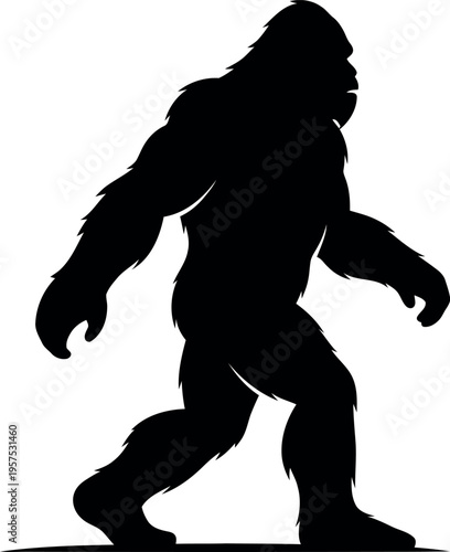 Black silhouette of bigfoot walking