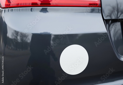 Blank white round sticker on car rear bumper, ai generated. Empty foil badge on automobile for parking number or notice mockup, close view. Clear adhesive circle label for driver sign template.