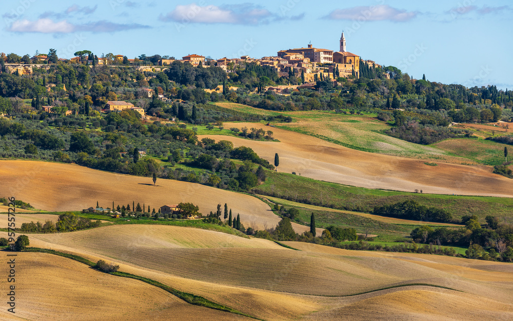 Fototapeta premium Pienza historic village dominating rolling Tuscan hills and fields, Italy.