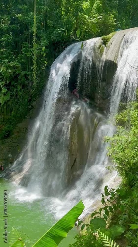 Close-up slow motion of Gozalandia Falls waterfall in Puerto Rico with natural sound