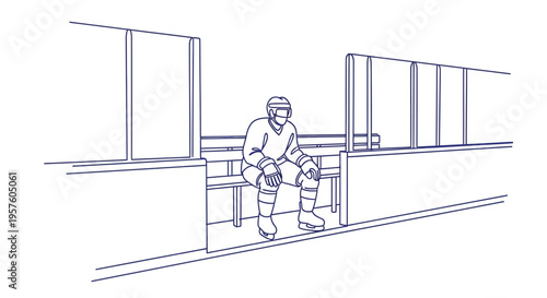 A lone hockey player sits on the bench waiting during a game or practice high quality