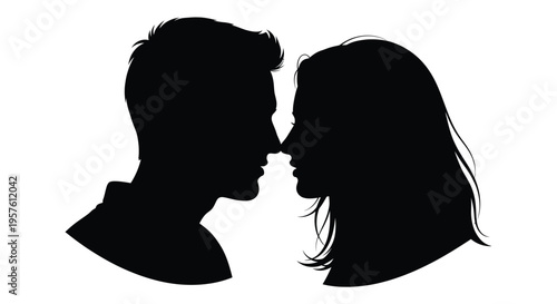 A couple facing each other in a romantic dark silhouette