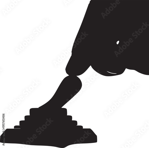 A silhouette of a hand pressing a joystick button