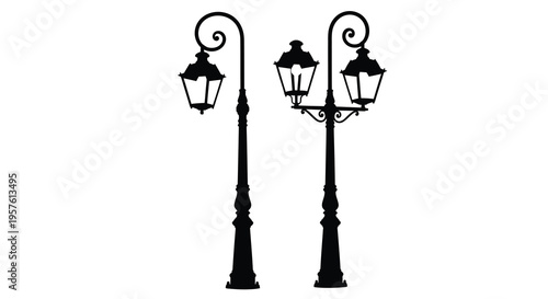 Two ornate street lamps stand against a white background silhouette