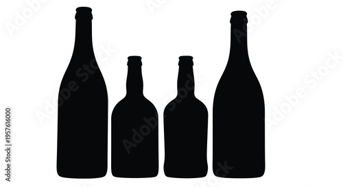 Three wine bottles stand together in a stark black silhouette