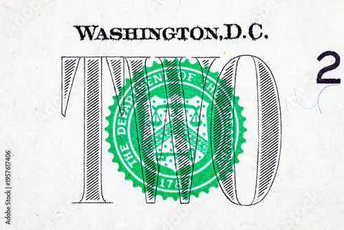 2 dollars of the United States of America with a fragment of the banknote for design. US money.