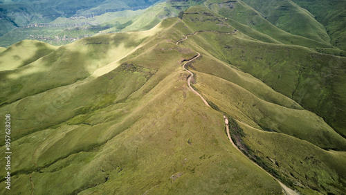 Winding Ridge Spine In South Africa, Narrow Path Following Summit Line With Dramatic Dropoffs And Sweeping