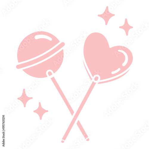 Two pink heart shaped lollipops