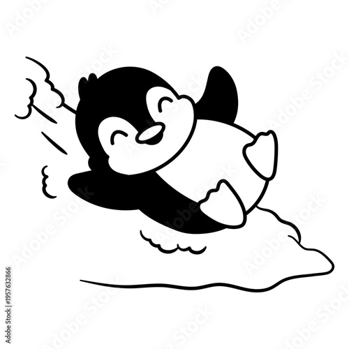 Penguin sliding down snow