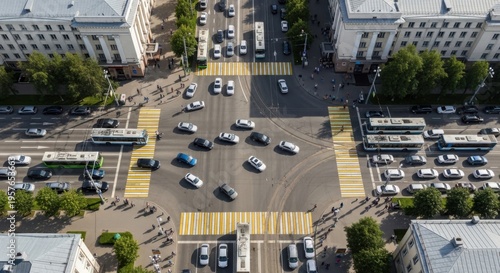 Busy Urban Intersection Showing Traffic Flow And Pedestrian Crosswalks From Above