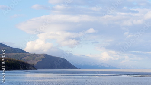 The icy shore of Lake Baikal in Russian Siberia in late spring. The northernmost point of Lake Baikal is located in the small town of Nizhneangarsk.