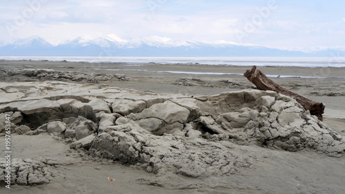 The icy shore of Lake Baikal in Russian Siberia in late spring. The northernmost point of Lake Baikal is located in the small town of Nizhneangarsk.