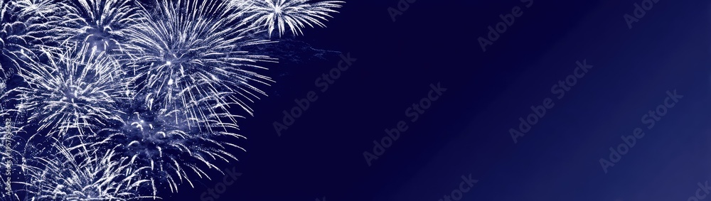 Naklejka premium Fireworks display against dark night sky sparkling explosions celebration