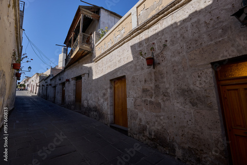 timeless sillar stone facades of San Lázaro, Arequipa's oldest neighborhood, where colonial-era architecture and cobblestone streets whisper centuries of Andean heritage — a serene, walkable sanctuary