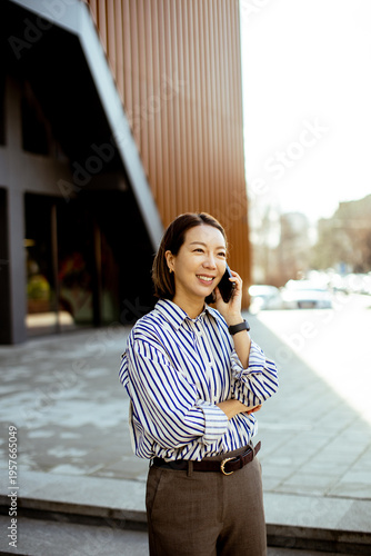 A Korean woman is talking o...
