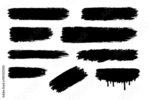 Collection of black grunge brush strokes and ink splatters isolated