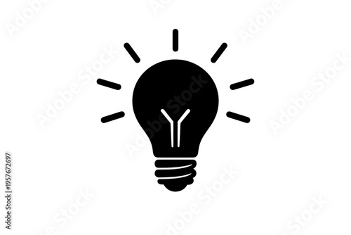 A black silhouette of a light bulb with radiating rays of light