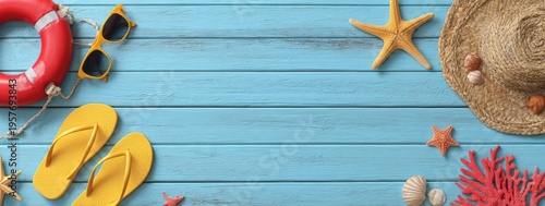 Summer vacation essentials on blue wooden planks - a vibrant flat lay.