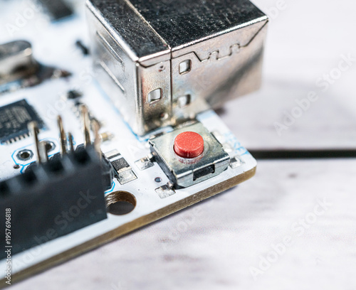 Obraz na płótnie USB connector and reset button on electronics development board macro.