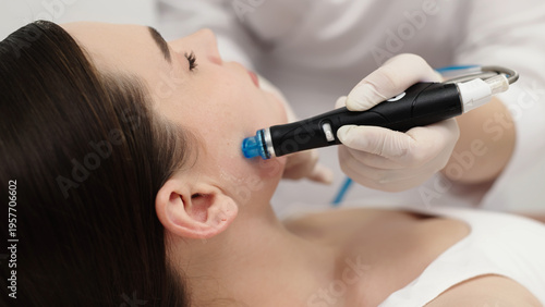 Professional Hydrafacial procedure for deep pore cleansing and skin hydration. Beauty concept.
