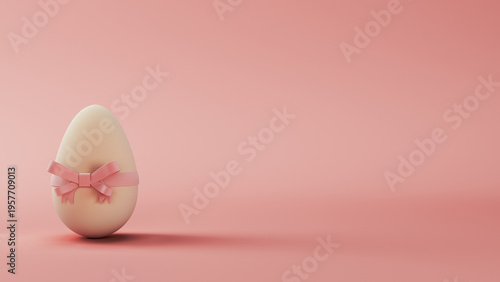 Easter egg with pink ribbon bow on pastel background
