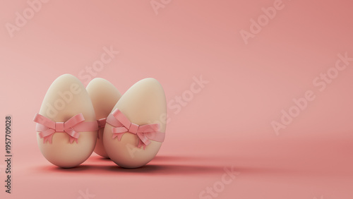 Easter eggs with pink ribbon bow on pastel background